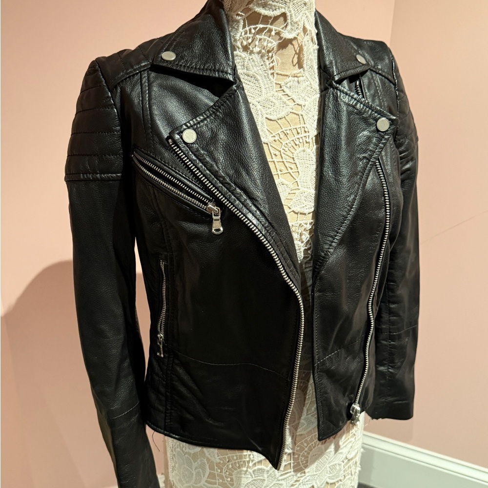 Barney's leather jacket